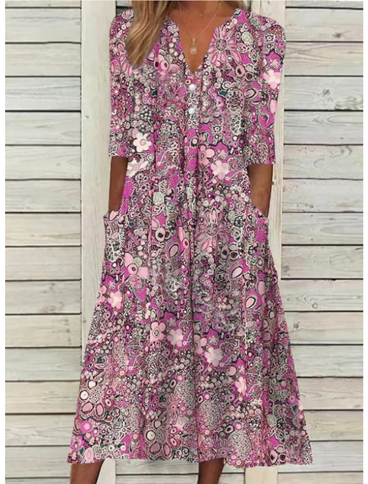 Pink floral printed midi dress with V-neck and three-quarter sleeves