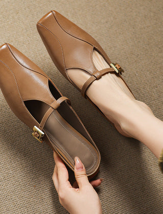 Brown leather mules with gold buckle sling strap, open heel and stitched square toe