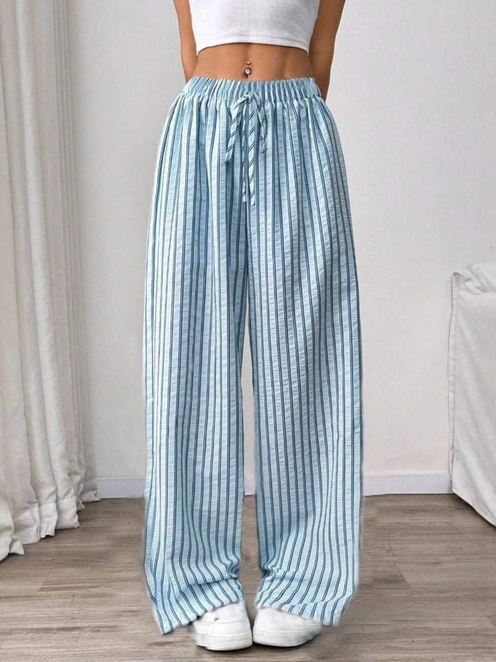 Sky blue striped trousers with elastic drawstring waist and wide legs