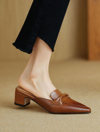 Brown leather slip-on mule with square toe and chunky low heel, side view