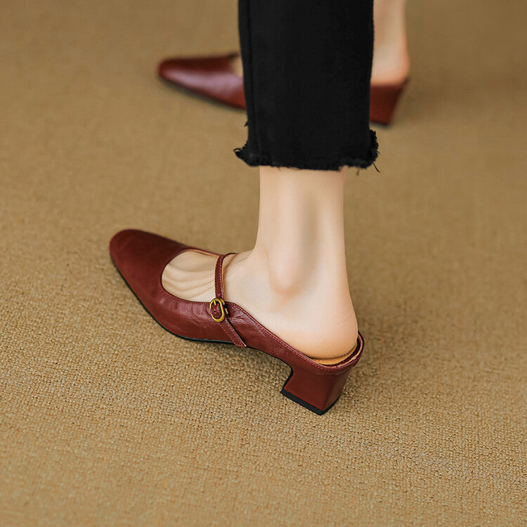 Maroon leather mule with open sling, low block heel, pointed toe and gold buckle