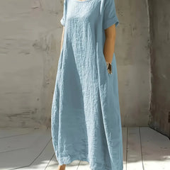 Light blue casual maxi dress with short sleeves and round neckline, airy long silhouette