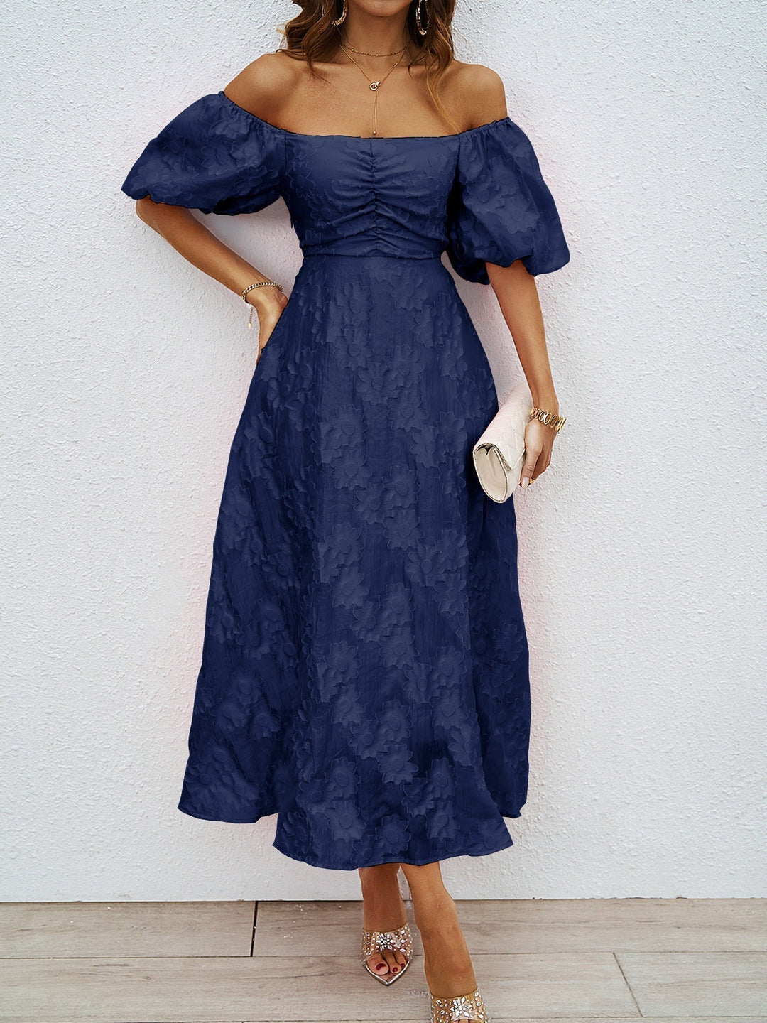 Navy off-shoulder midi dress with short puff sleeves and gathered waist