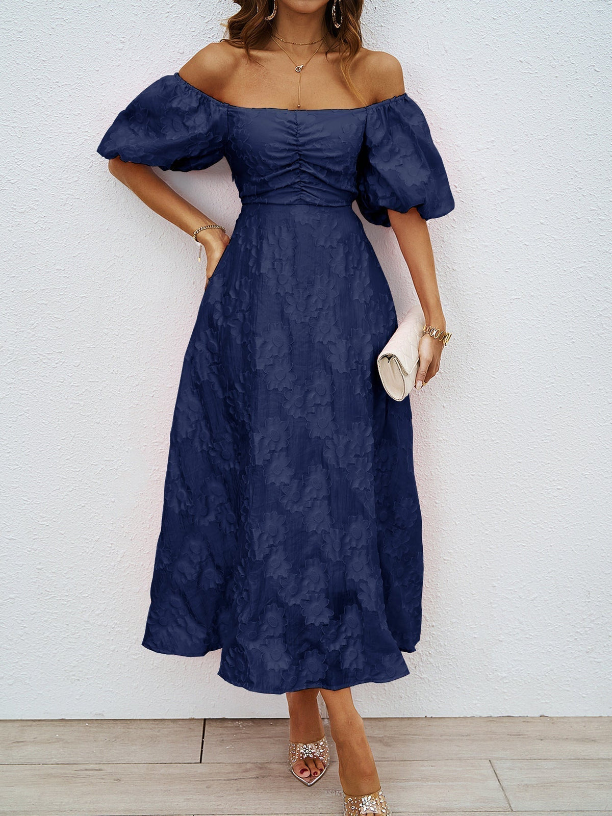Navy off-shoulder midi dress with short puff sleeves and gathered waist