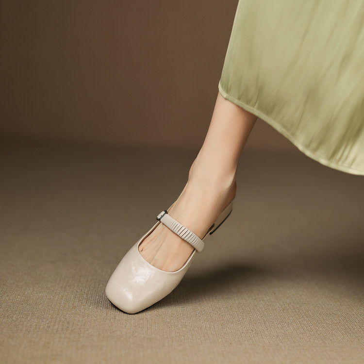 Cream leather Mary Jane mule flats with slim ankle strap and silver buckle