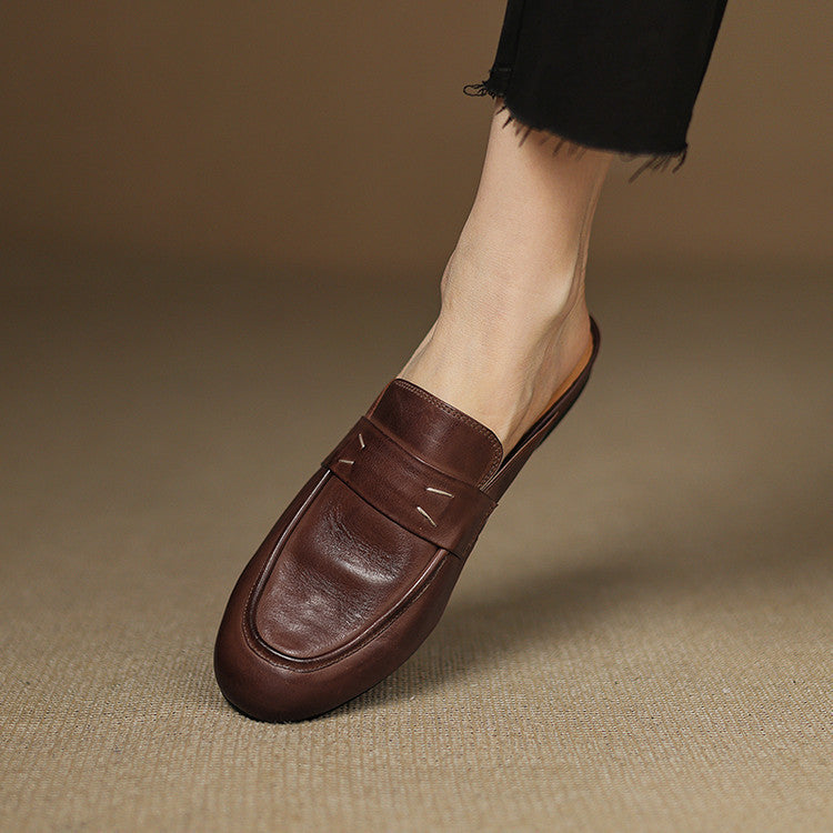 Brown leather mule with square toe, slip-on strap, and low sole