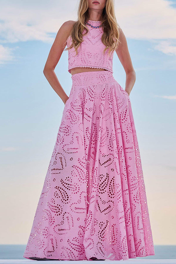 Women’s pink eyelet set dress with sleeveless bodice and flowing A-line skirt