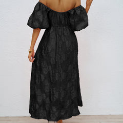 Black off-shoulder midi dress, back view, with puff sleeves and gathered waist
