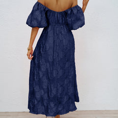 Navy off-shoulder midi dress from back view with puff sleeves and waist gathers