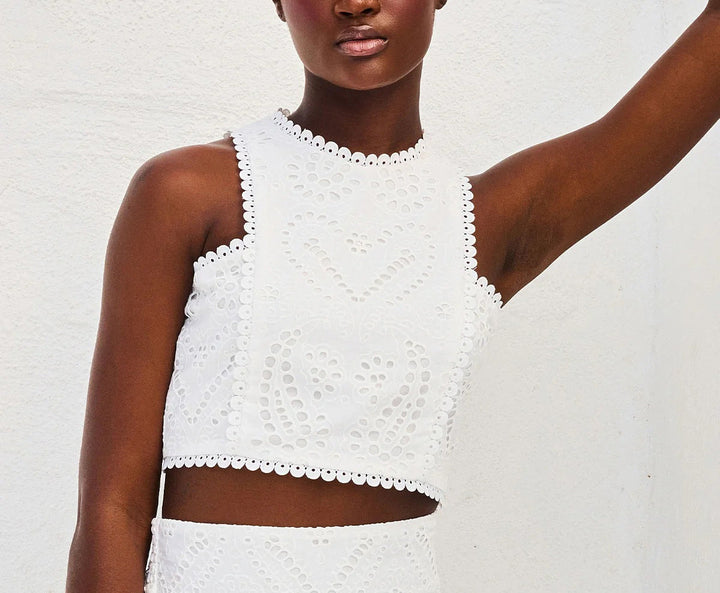 Women’s white eyelet set dress top with high neckline and sleeveless scalloped trim
