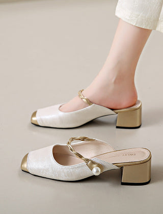 White genuine leather mules with block heel, chain strap, and pearl detail at vamp.