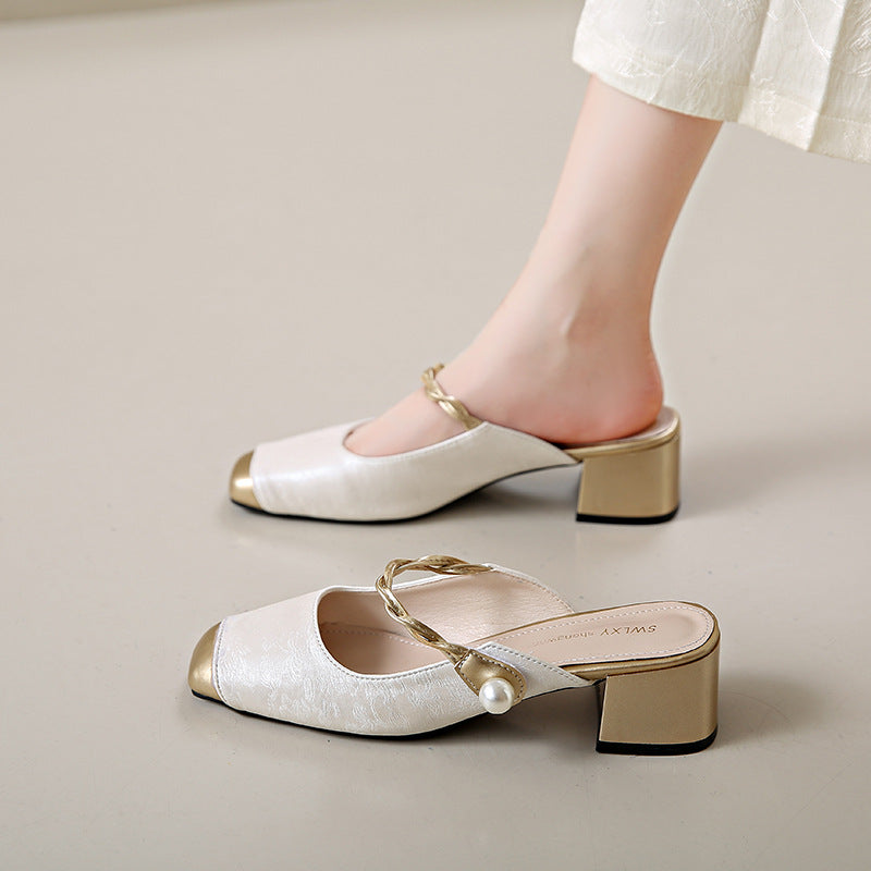 White genuine leather mules with block heel, chain strap, and pearl detail at vamp.
