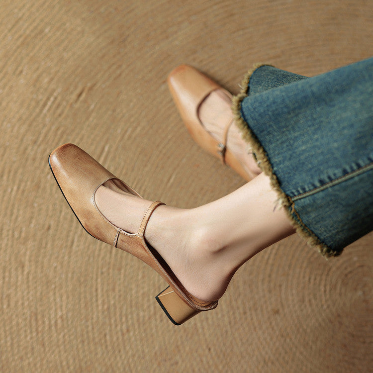 Apricot leather mule with slim strap buckle and chunky block heel, side view
