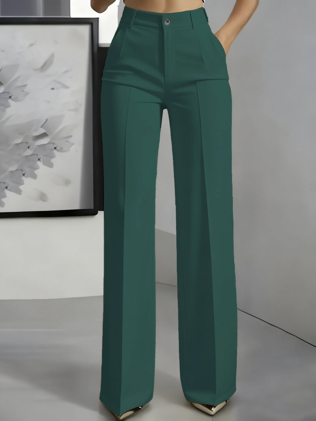 Deep teal high-waisted straight-leg trousers with front button and pressed creases
