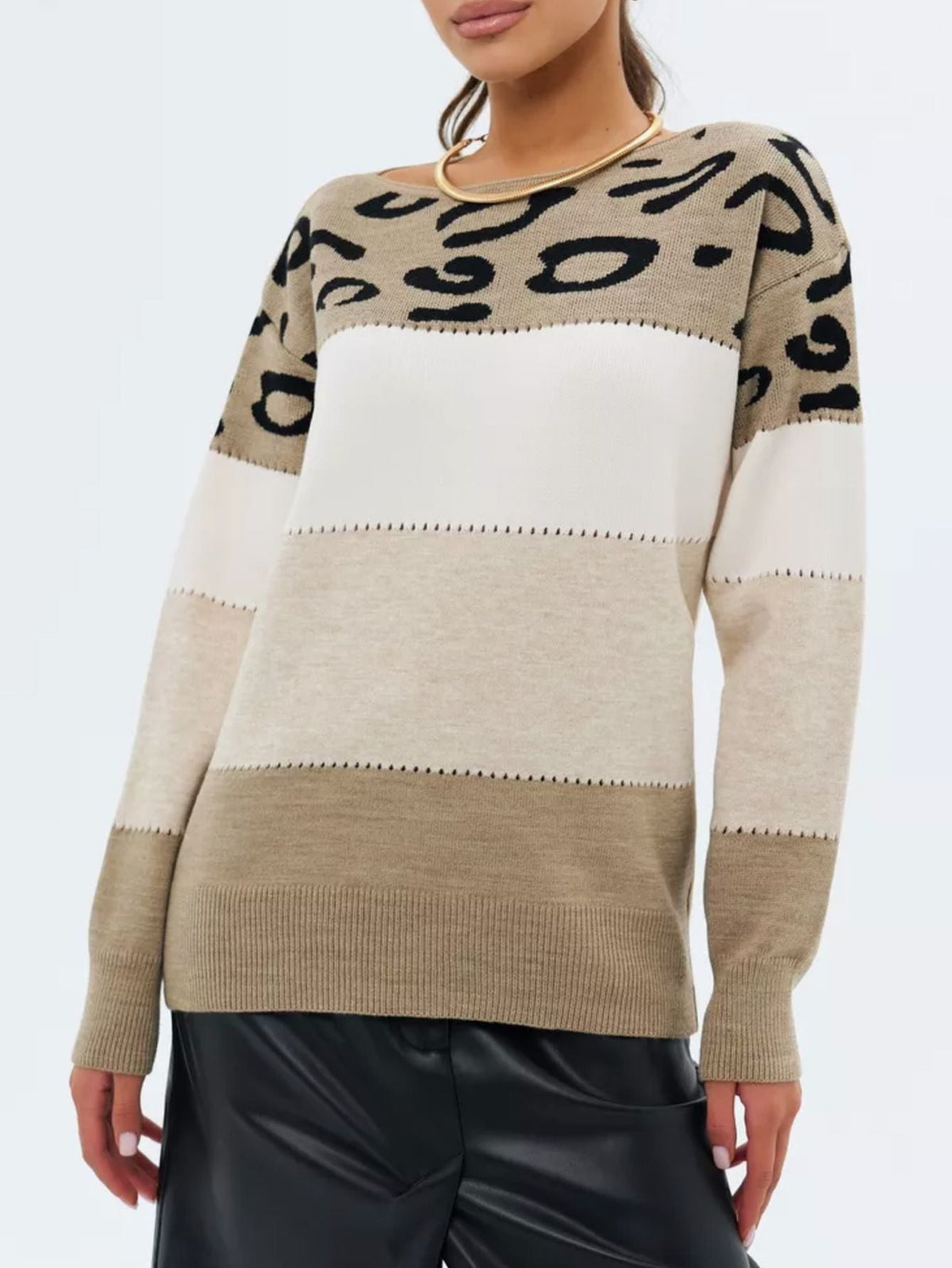 Leopard-print crewneck knit sweater with white upper and tan lower panel