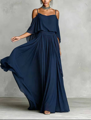 Navy blue draped cold-shoulder maxi dress with layered cape sleeves and pleated skirt