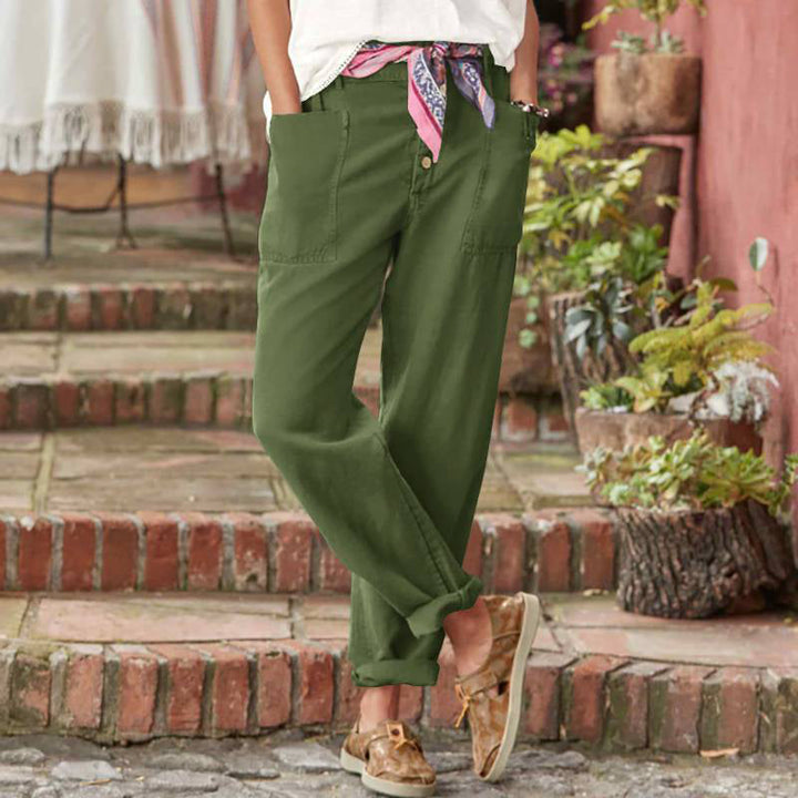 Olive green casual pants with button fly, slanted pockets, and cuffed ankle hem