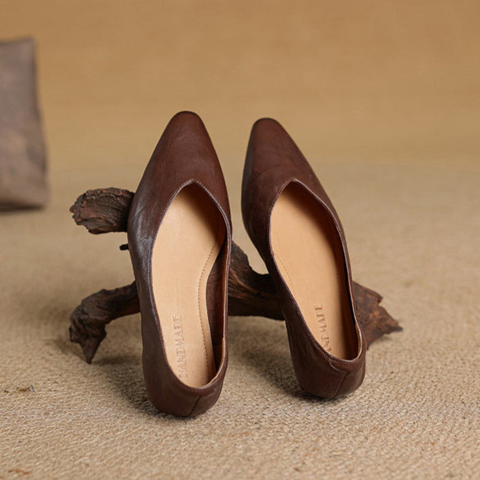 Dark brown genuine leather mules with almond toe, side view