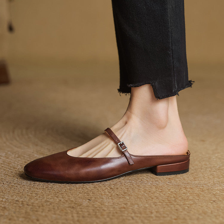 Brown genuine leather mule with cross strap buckle and low block heel