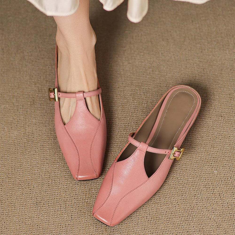 Pink leather mules worn with sling strap and gold buckle, open heel, low heel