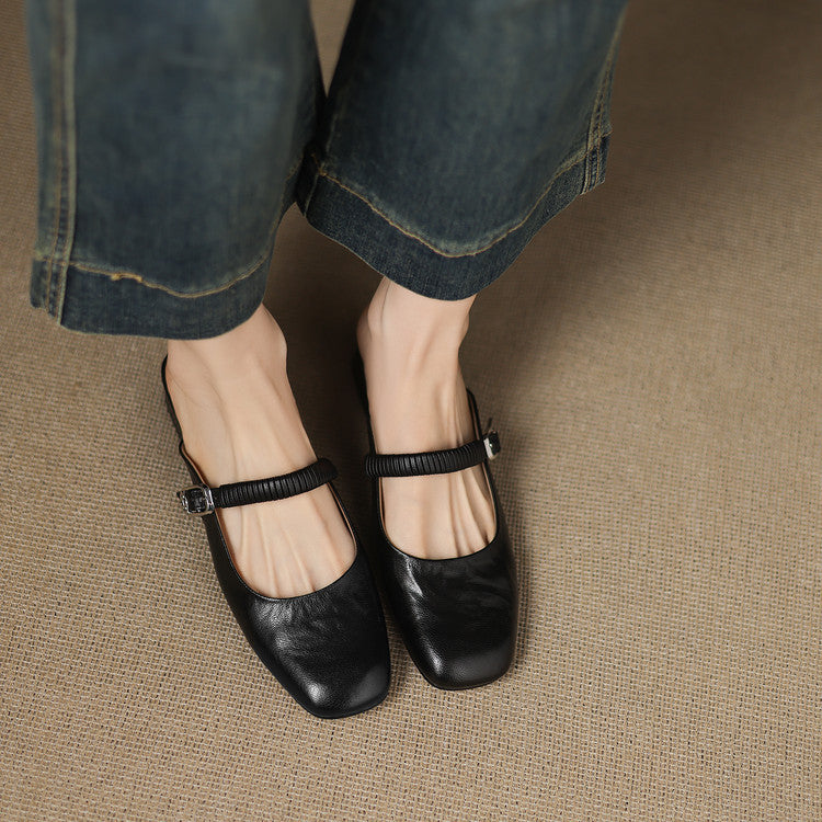 Black leather Mary Jane mule flats with ankle strap and metal buckle, low block heel