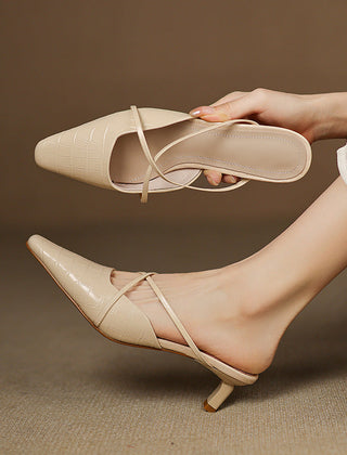Beige genuine leather mules with crisscross straps and pointed toe, low heel