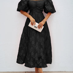 Black off-shoulder midi dress with puff sleeves and cinched waist