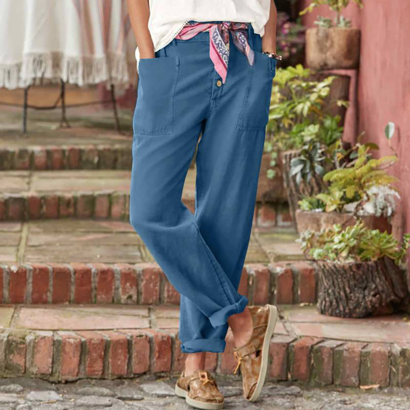 Blue casual pants with button fly, slanted pockets, and cuffed ankle hem
