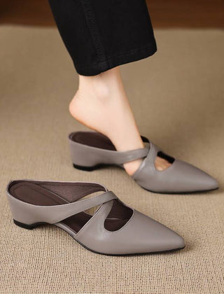 Gray pointed-toe mule with cross-strap cutout and low block heel