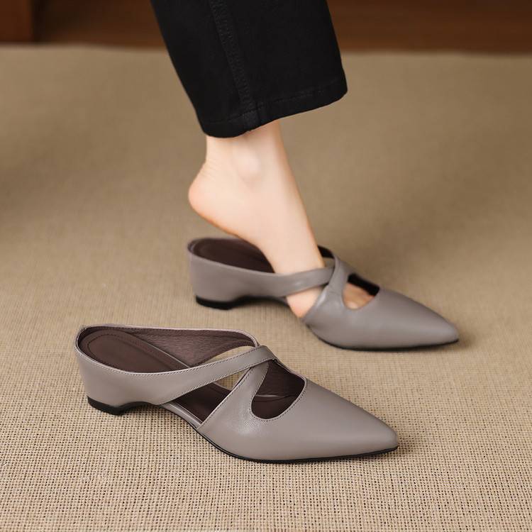 Gray pointed-toe mule with cross-strap cutout and low block heel