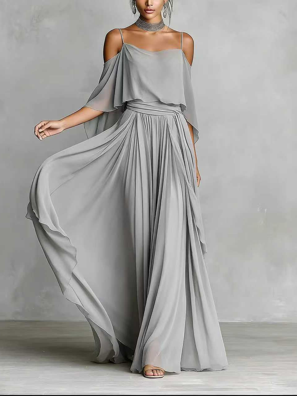 Grey draped cold-shoulder maxi dress with off-shoulder cape and pleated bodice