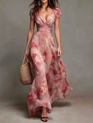 Women’s pleated maxi dress with pink watercolor floral print, V-neck, cap sleeves