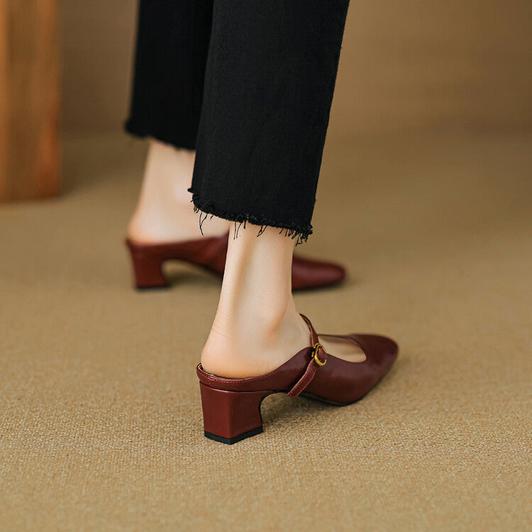 Maroon leather mule with low block heel and sling strap, side view on foot