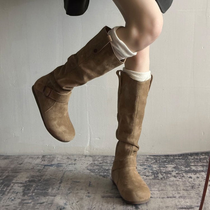 Brown suede flat-sole orthopedic boots with buckle strap and side zipper