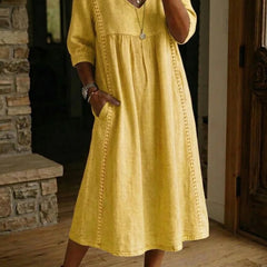 Yellow maxi dress with ruched V-neck, 3/4 sleeves, gathered waist