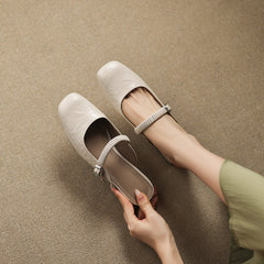 Beige leather Mary Jane mule with elastic strap and buckled detail, low block heel