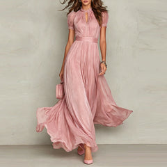 Pink chiffon maxi dress with puff sleeves and keyhole neckline, pleated empire waist, flared skirt