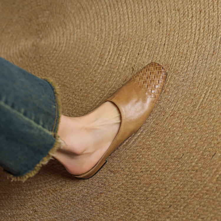 Brown leather mule with woven pattern across the toe and open topline