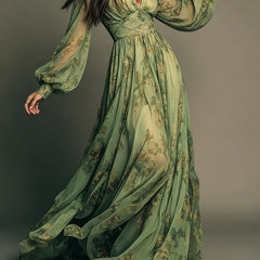 Green floral maxi dress with gathered V-neck and long sheer puff sleeves
