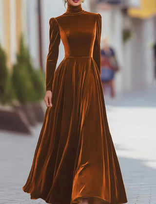 Orange velvet dress with high neck, long sleeves, fitted bodice, flared skirt