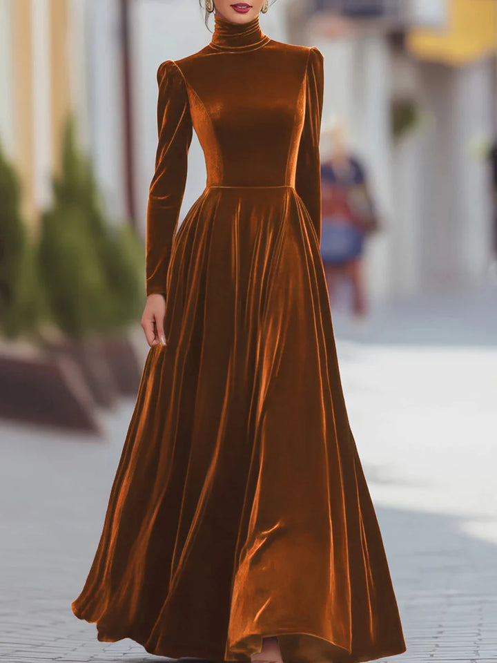 Orange velvet dress with high neck, long sleeves, fitted bodice, flared skirt