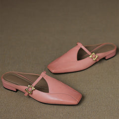 Pink leather mule slides with open back and gold buckle sling strap, low block heel