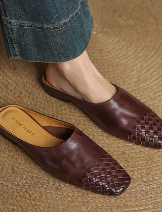 Brown leather mules with square toe and woven front, worn with denim