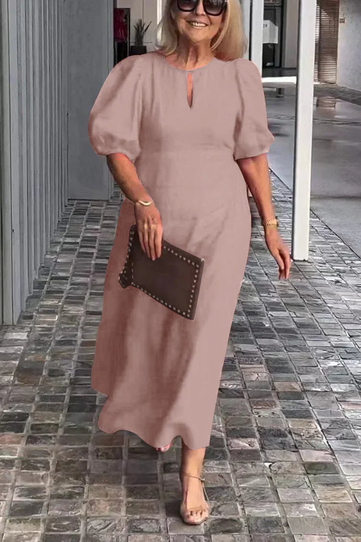 Khaki puff-sleeve midi dress with keyhole neckline and subtle front seam detail