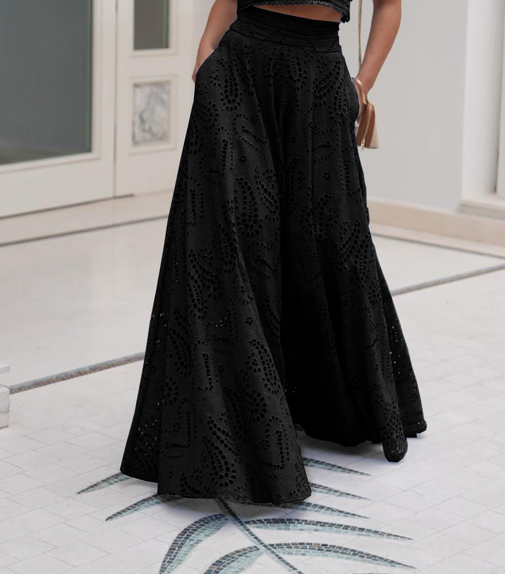 Women’s eyelet sleeveless maxi skirt set in black, pleated full skirt with lace pattern.