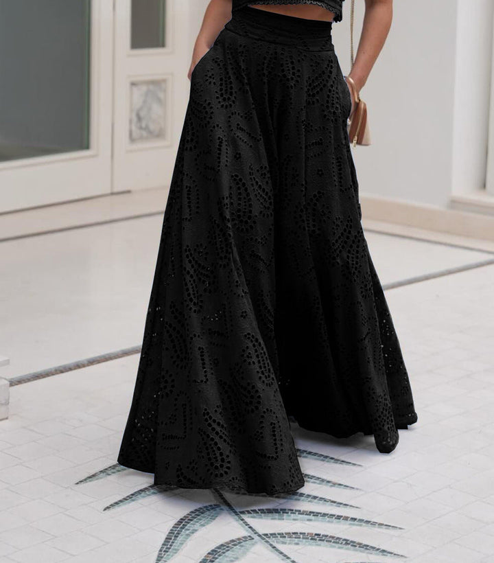 Women’s eyelet sleeveless maxi skirt set in black, pleated full skirt with lace pattern.