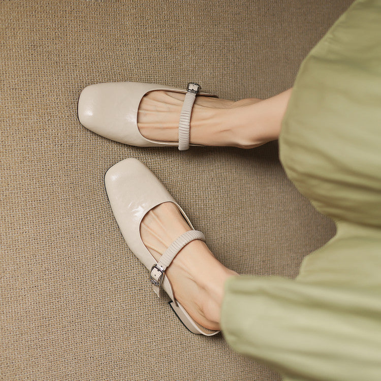 Cream leather Mary Jane mule flats with ankle strap and buckle closure