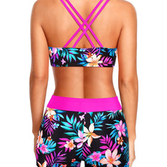 Tropical swim set from behind with pink straps, floral bandeau top, and matching shorts