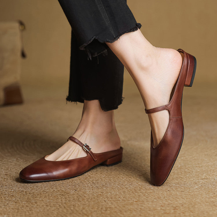 Brown leather mules with buckle slingback strap and low stacked heel