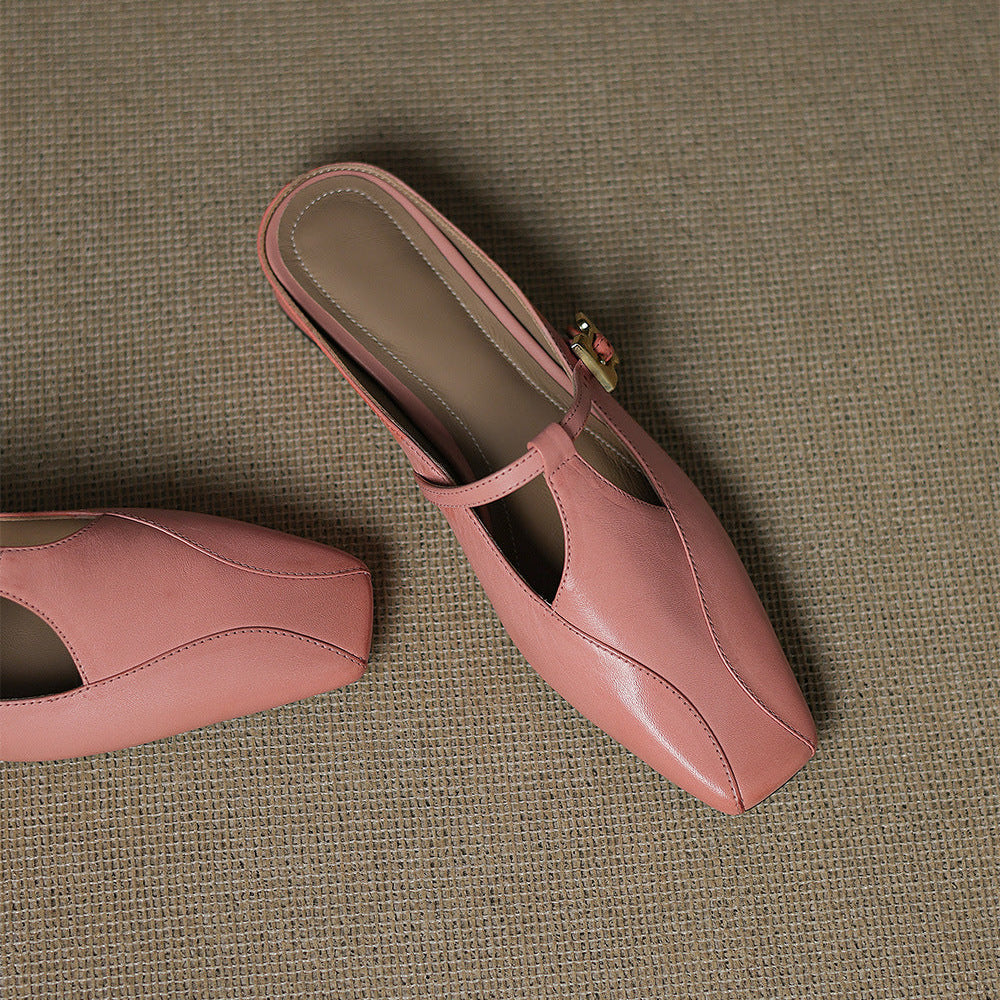 Pink leather mules on display, open heel, gold buckle sling strap, low block heel